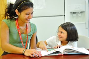 Marlena reading with a tutor